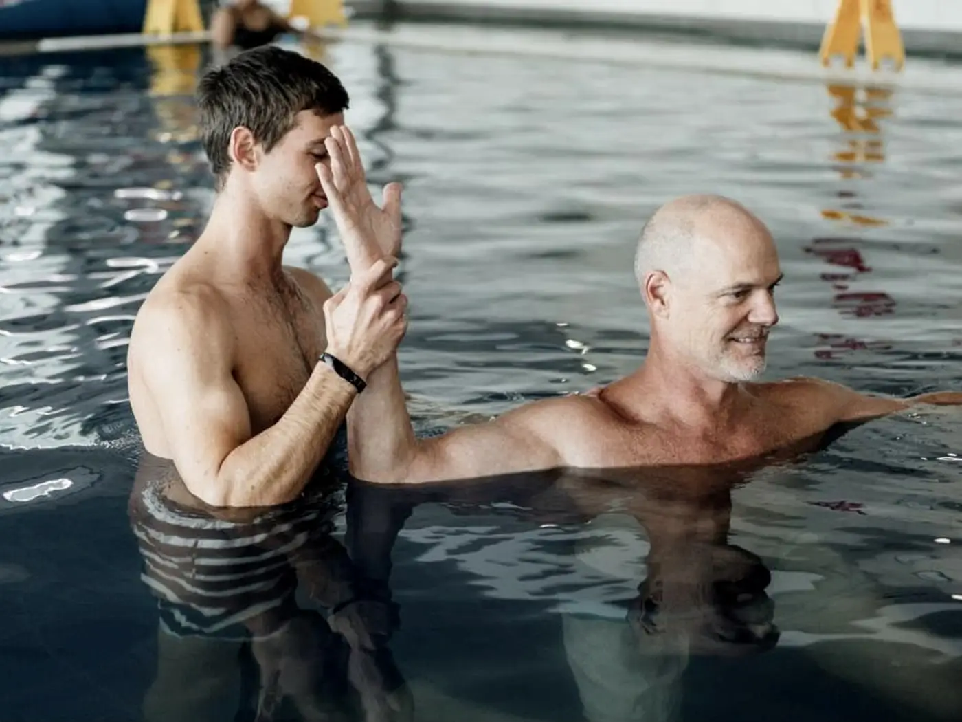 Aquatic rehabilitation taking place in a hydrotherapy pool
